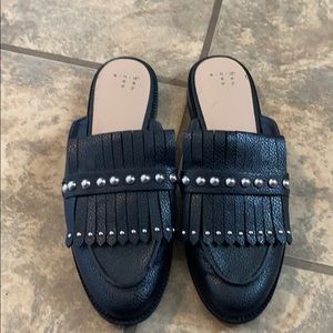 Black and silver mules